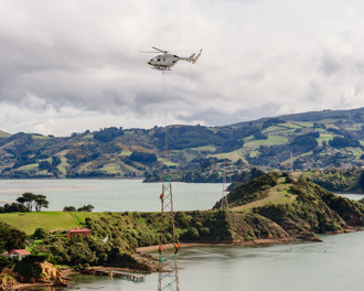 Helicopter removing parts of a tower