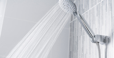 Bathroom shower head spraying water